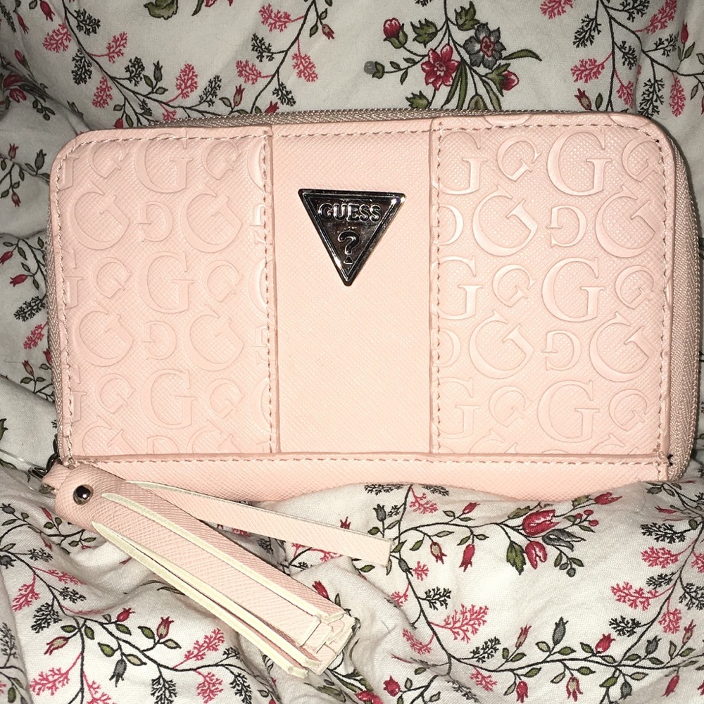 Authentic pink Guess wallet  (price is negotiable)